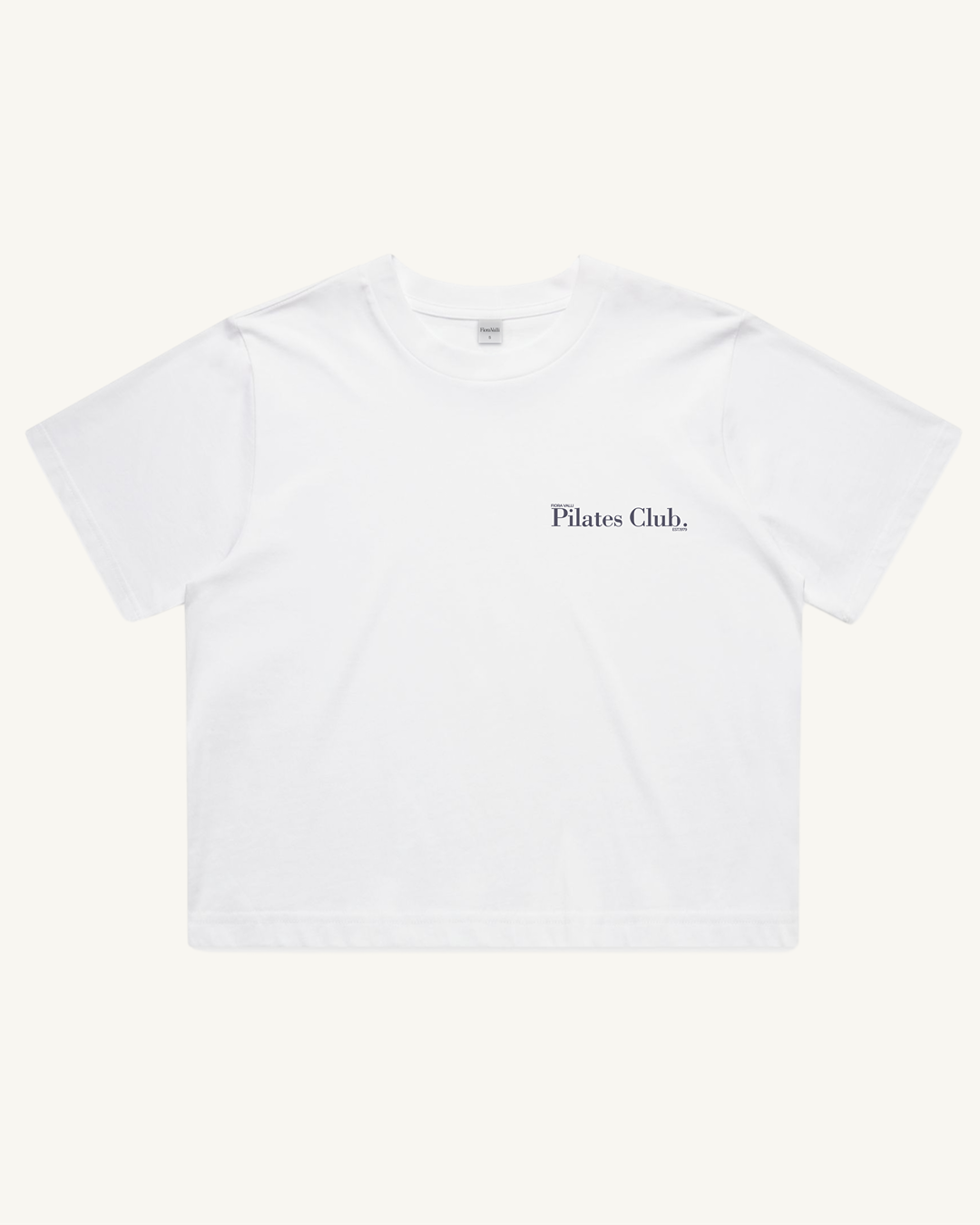 White t-shirt with 'Pilates Club' text on a white background
