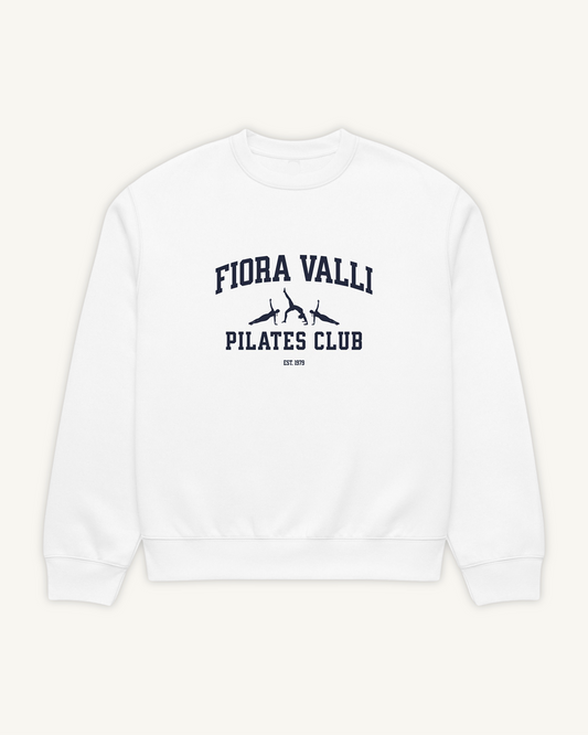 White sweatshirt with 'Fiora Valli Pilates Club' text on a white background
