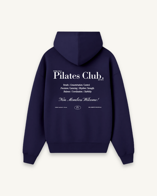 Navy blue hoodie with 'Pilates Club' text on the back against a white background