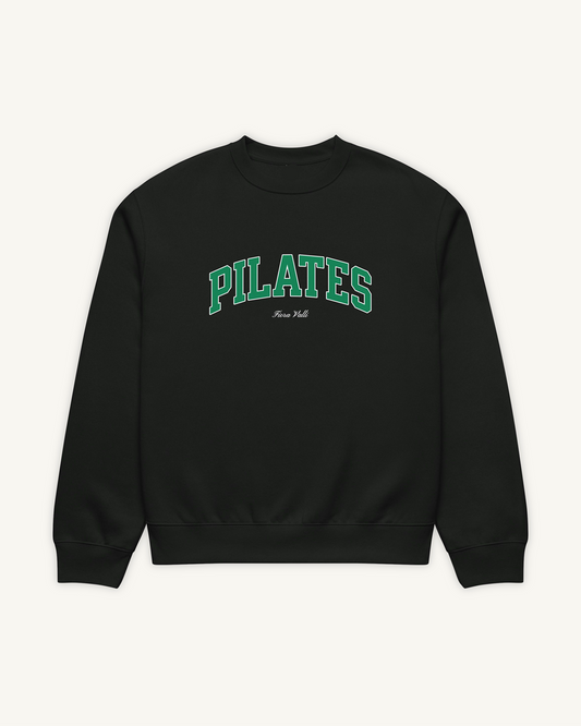 Black sweatshirt with 'PILATES' text in green on a white background
